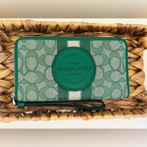Coach Dempsey Large Phone Wallet In Signature Jacquard With Stripe Coach Patch